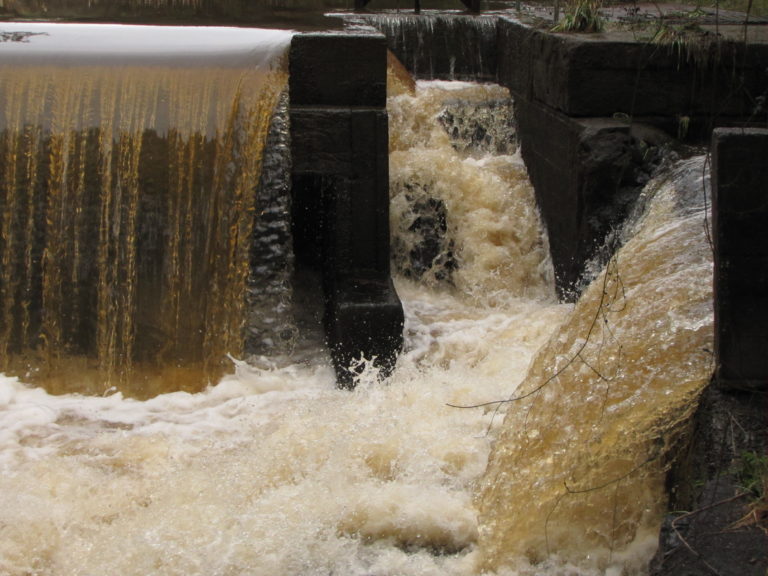The Brid River in flood at the Wier